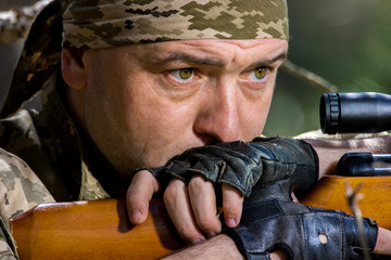  young man with an air rifle