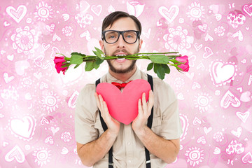 Geeky hipster offering valentines gifts against valentines heart design