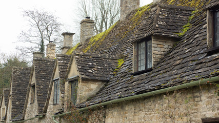 Fototapeta na wymiar Houses of Arlington Row and road in the village of Bibury, England, United Kingdom