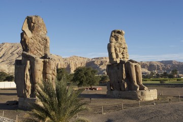 Statues of Pharaoh Amenhotep, Colossus of Memnon in the Western Teams of Egypt
