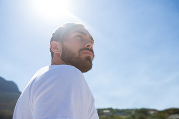 Low angle view of thoughtful man