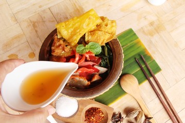 noodle soup with red sauce is delicious