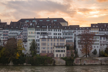 Fototapeta na wymiar Riverside buildings in Grossbasel part of the Old Town of Basel