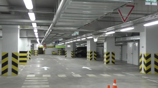 Parking garage underground, industrial interior, parking lanes