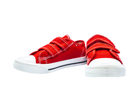 Fashion for kids. Sneakers red thick fabric. Isolated on white background.