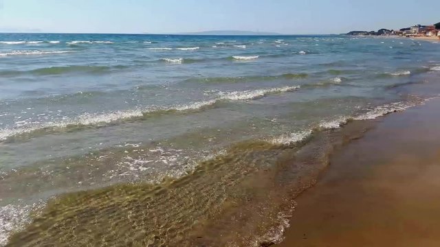 tide and little waves at Follonica beach
