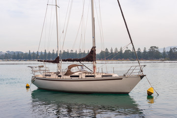 Close up of yacht moored at Narooma, NSW, Australia