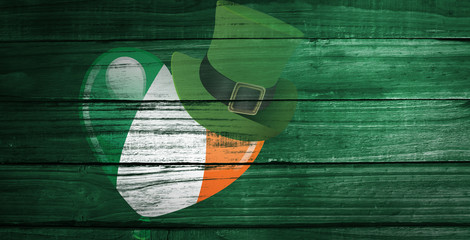 patricks day graphics against overhead of wooden planks