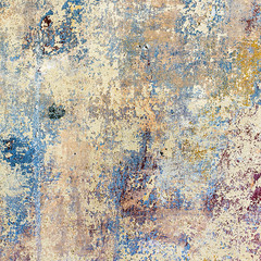 grunge wall of an old house with remainings of color