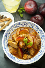 Meat stew with plums and spices