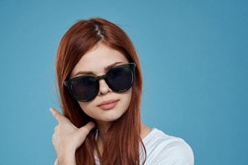 Fototapeta premium portrait of young woman in sunglasses