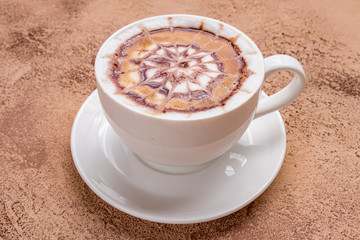 Cup of coffee on a rusty background