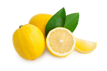 fresh lemon with green leaves on white