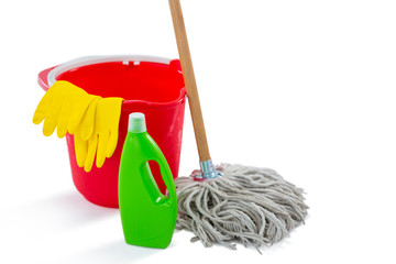 Close up of cleaning products and mop with bucket