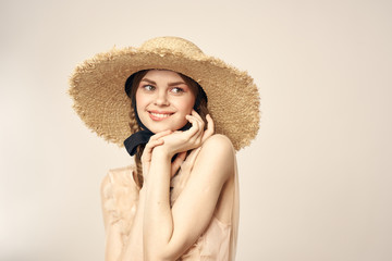 happy woman in black garter straw hat