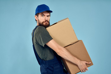 courier in uniform with box isolated on white