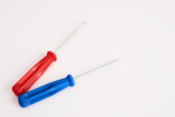 Fototapeta premium blue and red screwdrivers on a white background