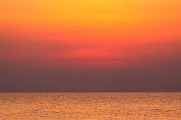 In the morning, sky and sea will turn to be red because of the sunrise light.