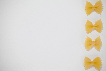 Farfalle pasta arranged in a row