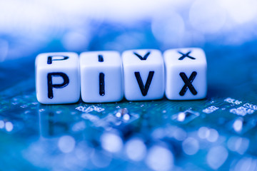 Word PIVX formed by alphabet blocks on mother cryptocurrency