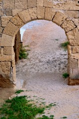 Fototapeta na wymiar Arch in the medieval old town 