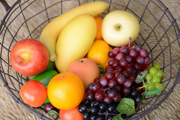 Basket and fresh fruits