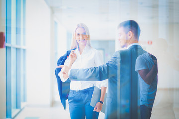 Fototapeta premium Smiling successful business team standing in office . business