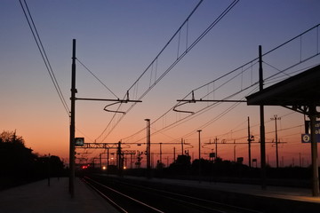 Fototapeta na wymiar the rail ways in sunset