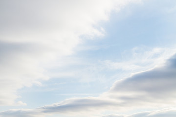 Large white Cumulus clouds on blue sky