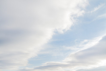 Large white Cumulus clouds on blue sky