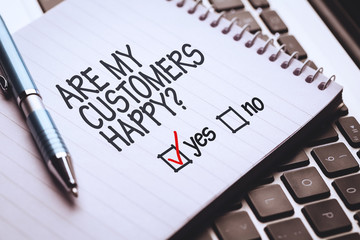 yes no against notepad on laptop