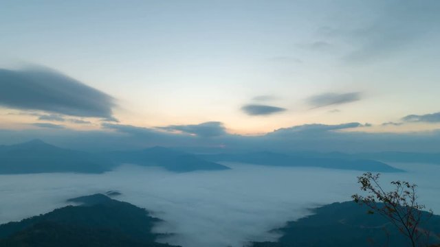 Sunrise at mountain and foggy in the morning, time lapse.