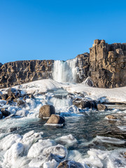 Oxararfoss waterfall in winter of Iceland