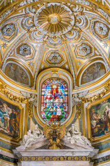 Fototapeta na wymiar Stained glass of the Church of Santa Maria dell'Anima, in Rome, Italy.