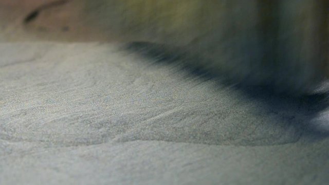 Metallic powder for laser sintering machine for metal. Metal powder is sintered under of laser into desired shape. 3D printer printing metal. Modern additive technologies 4.0 industrial revolution