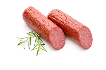Salami smoked sausage, basil leaves on white background cutout.