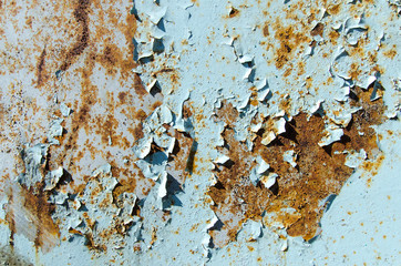 Texture of rust with the exfoliated blue paint