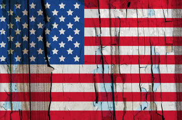Fototapeta na wymiar Texture of USA flag on grunge wood with the exfoliated paint
