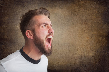 Portrait of a shouting man with a beard - obrazy, fototapety, plakaty