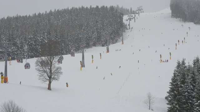 Ski slope with skiers