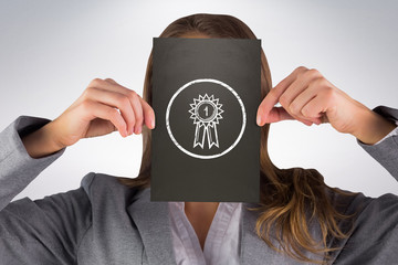 Businesswoman showing card  against grey background