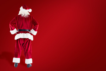 Santa Claus against red background