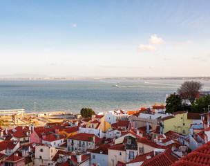 Old Lisbon Portugal panorama. cityscape with roofs. Tagus river. miraduro viewpoint. View from sao jorge castle