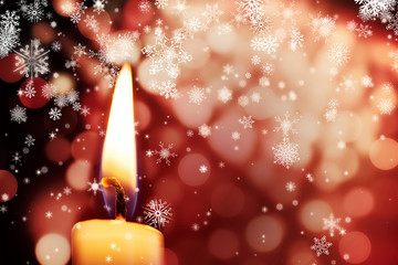 Obraz na płótnie Canvas Snowflakes against candle burning against festive background