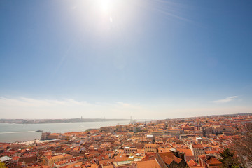 Old Lisbon Portugal panorama. cityscape with roofs. Tagus river. miraduro viewpoint. View from sao...