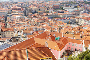 Fototapeta na wymiar Old Lisbon Portugal panorama. cityscape with roofs. Tagus river. miraduro viewpoint. View from sao jorge castle