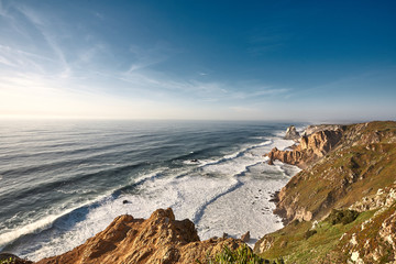 Exploring Portugal. Cabo da Roca ocean and mountains view landscape, authentic capture, wanderlust concept.