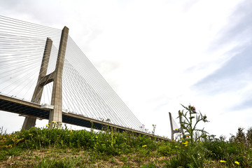 The Vasco da Gama Bridge in Lisbon, Portugal in a summer day. beautiful colors