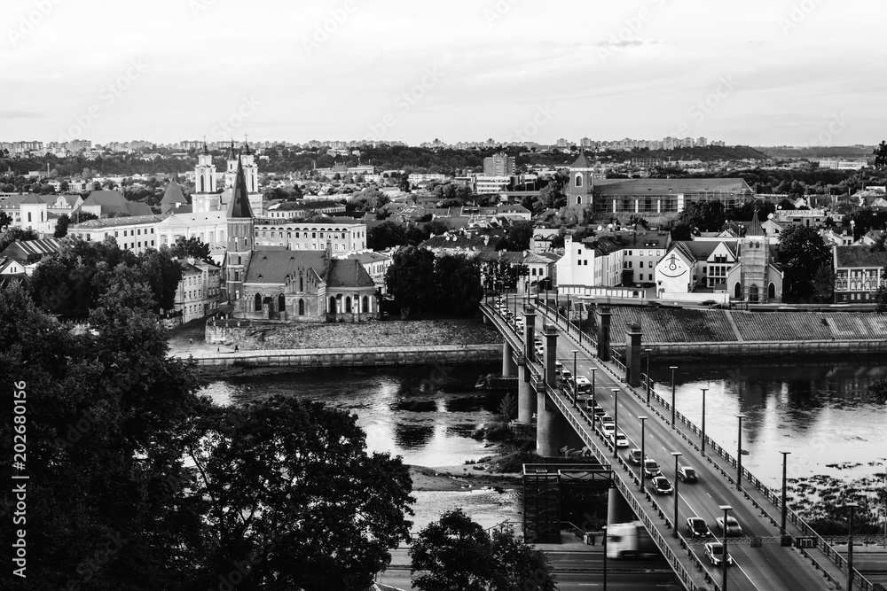 Sticker aerial view of famous city kaunas, lithuania at sunset. evening view. black and white