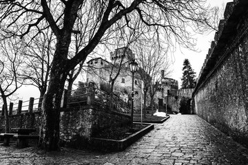 San Marino fortress of Guaita on Mount Titano in the evening. Black and white